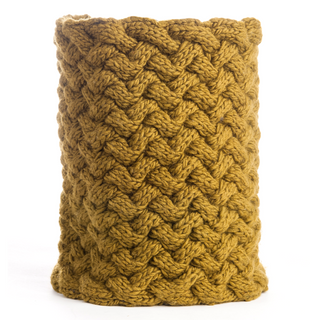 A mustard yellow Holden Neckwarmer, knitted with a cable stitch pattern.