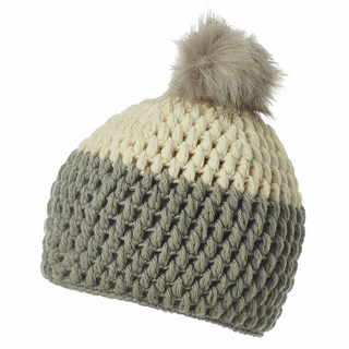 A Dimensions Crochet Beanie with a Faux Fur Pom on top, featuring a gradient from cream to gray colors, isolated on a white background.