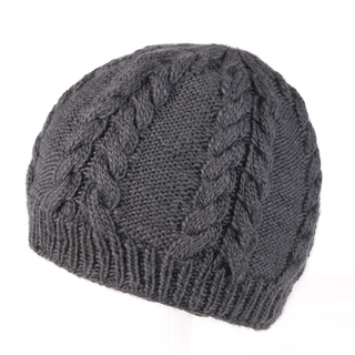A handmade in Nepal, dark gray Cable Beanie displayed against a white background.