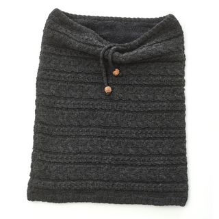 A black merino wool Lou Neckwarmer with a wooden button.