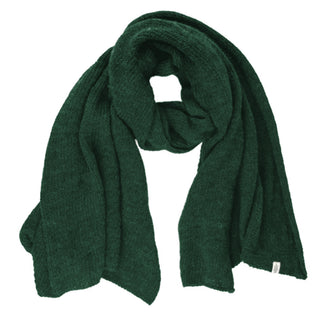 The Air Wrap Scarf, handknit in Nepal from dark green merino wool, is displayed flat with its ends spread apart and the center gracefully looped.