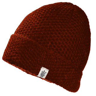 The Baltic Hat is a handmade, dark red knitted wool hat from Nepal, featuring a folded brim and a small white tag with a black logo on the front.
