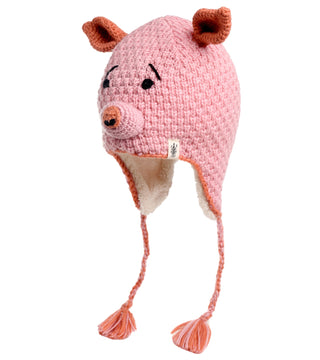 The Crochet Piggy Hat is a pink knit hat designed to resemble a pig, featuring ears, a snout, and an embroidered face. This 100% wool hat has earflaps with braided tassels and a soft-lined interior, and it is hand-made in Nepal.