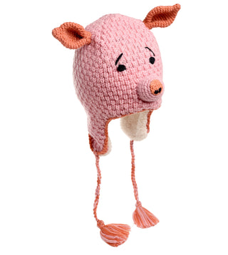 The Crochet Piggy Hat is a hand-made, pink knitted hat from Nepal, crafted from 100% wool. Designed to resemble a pig's face, it features charming pig ears, eyes, and a snout. The hat includes ear flaps and two light brown braided tassels hanging down on either side for added warmth and style.