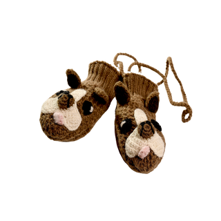 Introducing the Crochet Bulldog Mittens, a charming pair of hand-made brown children's mittens from Nepal. These delightful mittens feature intricate animal faces with ears, eyes, noses, and pink mouth detailing. Connected by a string and set against a black background, they beautifully highlight their exquisite design.