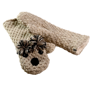 A pair of crocheted mittens in a light beige color, hand-made in Nepal from 100% wool. One mitten features a design resembling a koala's face with black yarn for the eyes, nose, and ears, along with two pom-poms. The other mitten is plain with a textured knit pattern.