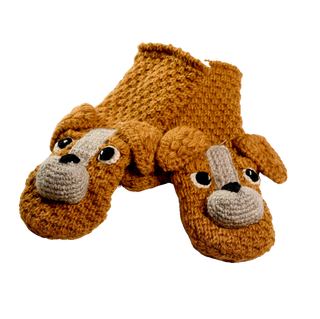 The Crochet Lucy Puppy Mittens are a pair of sherpa-lined mittens, featuring a design resembling brown dog faces with black and white eyes, beige snouts, and floppy ears. These delightful wool mittens are handmade in Nepal using textured orange-brown yarn.