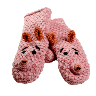 A pair of pink, sherpa-lined Crochet Piggy Mittens is displayed. The mittens have a design featuring the face and ears of a pig, with brown noses and black eyes and eyebrows. Handmade in Nepal, the heel and toe sections are solid, while the rest of the mitten has a textured pattern.