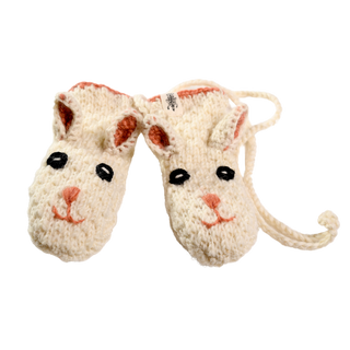 A pair of white crochet baby mittens, hand-made in Nepal, designed to look like bunnies with sewn-on black eyes, pink noses, and inner ears. The mittens have a single white string attached to them.