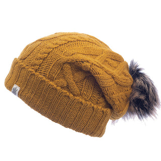 The north face women's Sugar Sugar Slouch with a faux fur pom.