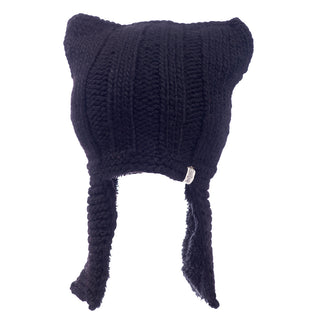 A black Illyrian helmet earflap on a white background.