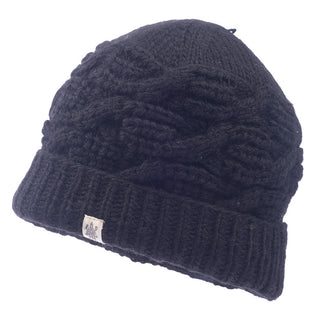 A black Side cable knit beanie from Nepal on a white background.