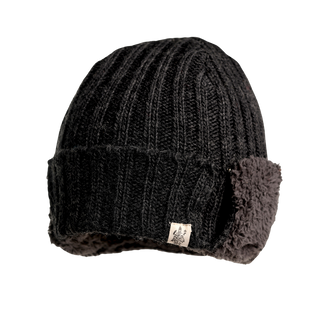 The Astor Hat is a black, ribbed knit winter hat that features a small tag with an emblem on one side. The fabric has a textured appearance, and the interior is lined with dark Sherpa Fleece for added warmth. The beanie is depicted against a plain white background.