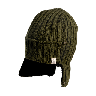 The Astor Hat is a green, knitted winter hat featuring ear flaps and a front visor. This beanie showcases ribbed stitching and includes a small fabric tag with a logo on the side. Made from cozy Merino wool, it contrasts brilliantly against the black background.