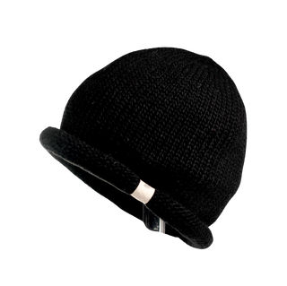 The Baxter Hat, a black knit winter beanie with a rolled-up brim and a small reflective label, is displayed against a plain white background.