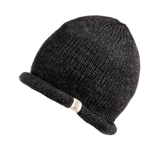 The Baxter Hat, a knitted, dark charcoal winter beanie, is displayed against a white background. It features a subtle textured pattern and a small white tag with a logo or design attached to the rolled-up brim. Made from cozy Merino wool, it ensures warmth and comfort in chilly weather.