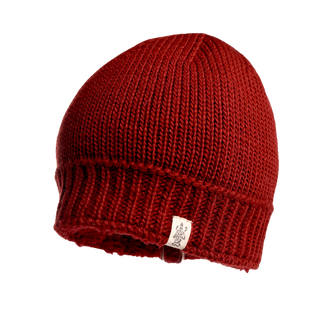 The Cabrini Hat is a red knitted beanie with a visible white label on its bottom edge. This winter hat features a ribbed pattern at the base and a smooth knit texture on the main body. The label showcases an intricate design, and the beanie is cozy with its soft fleece lining.