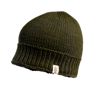 The Cabrini Hat is a green knitted beanie featuring a ribbed design and a small white tag with an intricate logo on the folded part, near the edge. This winter hat also offers a cozy fleece lining for extra warmth, set against a transparent background.