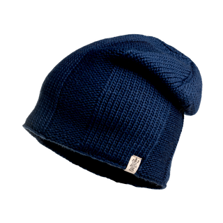 A blue Charles Hat featuring a textured pattern and a small fabric label is photographed against a white background, showcasing its premium knit as the perfect winter accessory.