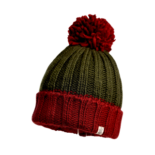 The Cherry Pom Hat is a ribbed-knit winter accessory featuring a dark green body, a red cuff, and a playful red pom-pom on top. Made from merino wool, it also includes a small white label on the side of the cuff.