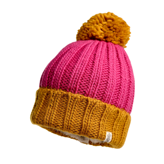 Introducing the Cherry Pom Hat, a beautifully knitted beanie featuring a pink upper section and a mustard yellow lower band and pom-pom. Made from luxurious merino wool, this hat showcases a ribbed texture and includes a petite tag on the lower band. Photographed against a plain black background, it's a standout accessory for any cold-weather wardrobe.