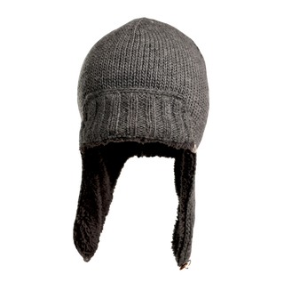 The Essex Hat is a gray, hand-knitted accessory featuring extended ear flaps lined with dark, fuzzy material. Its woolen texture ensures warmth and suitability for cold weather. The ear flaps hang down on either side, showcasing its high-quality craftsmanship. The image has a transparent background.