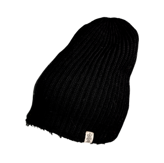 The Tudor Hat is a black knit beanie with a ribbed design, crafted from cozy merino wool. It features a small white tag with a logo near the edge and has a slightly slouched fit. This winter accessory is displayed against a plain background.