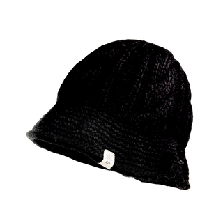 The Nostrand Hat is a black knit beanie with a ribbed texture and a small white tag on the bottom front edge. Ideal for your winter wardrobe, this slightly slouchy hat appears to be made of warm, thick merino wool.