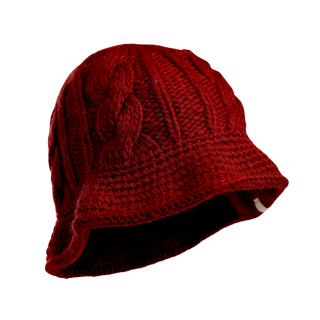 The Nostrand Hat, a red cable knit hat featuring a delicate pattern draped over a form, made from thick merino wool yarn and designed with a wide brim, provides exceptional warmth and comfort, making it an ideal addition to your winter wardrobe. The black background accentuates the details and texture beautifully.