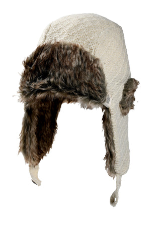 The Fern Hat is a white knit wool hat handmade in Nepal, featuring brown faux fur lining on the ear flaps, forehead, and interior. It includes side button detail and ties from the ear flaps—a cozy winter essential.