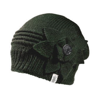 Handmade in Nepal, the dark green Hand Knit Monroe Hat features a fabric flower accent and a central button.