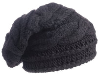 The Hand Knit Triple Braid Cable Slouch, a black, hand-knit hat featuring a cable knit pattern and slouchy design, is displayed against a white background.