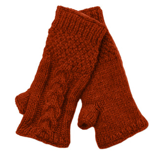 Cozy Cable Handwarmers: red Merino wool fingerless gloves with a textured cable pattern and small thumb opening, shown overlapping when laid flat—perfect winter gloves for women.