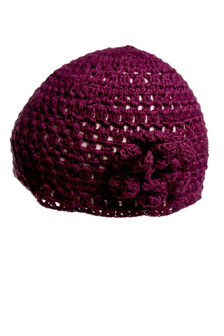 Part of our summer collection, the Flower Beanie in purple is a hand-crocheted masterpiece featuring a decorative flower pattern on the side. The knit design is open and breathable, perfect for warmer days.