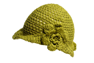 This "One Side Turned Up Hat" features a green, knitted design with a wide, curved brim and is adorned with a decorative crochet flower on the side. It has a loose, open-knit pattern, set against a white background.