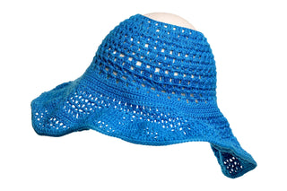 An Open Top Sun Hat in blue, featuring a wide brim and an openweave pattern, is shown. The hat appears lightweight and perfect for warm weather.