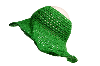 An Open Top Sun Hat, green in color with a wide brim and crocheted design, is displayed on a mannequin head against a white background. The hat features an open weave pattern and has slightly wavy edges.