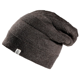 The Edgar Slouch is a dark brown, knitted beanie featuring a small white logo tag on the rim. It’s displayed on a plain white background.