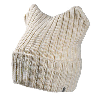The Ely Hat is a cream ribbed knit hat featuring two pointed cat-ear corners and a small black logo tag on its lower edge. Shown against a plain white background.