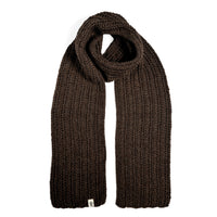 A Hand Crochet Velour Scarf in dark brown is laid out flat on a white background. The scarf showcases a thick, ribbed crochet texture and has a small white tag sewn onto one end.