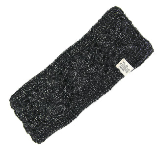 The Flower Hand Crochet Headband- LUREX is a black, handmade in Nepal wool headband with metallic thread and a small rectangular side tag for added charm.