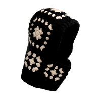 The Hand Crochet Patch Hood is a black knit balaclava featuring a crochet patch hood design with cream-colored crochet flower patterns arranged in a grid on the sides and top.