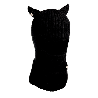 The "Hood With Horns" is a handcrafted black knitted balaclava featuring two small pointed ears on top and eye and mouth openings, making it an ideal winter accessory. It has a ribbed texture and is made from thick, cozy wool. A small white detail can be found near one of the ears. The background is transparent.