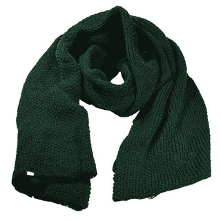 The Ithaca Scarf, a dark green wool accessory handmade in Nepal, is displayed on a white background with both ends visible and folds showing its rich texture—an ideal choice for winter.