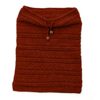 The Lou Neckwarmer is a folded, knitted merino wool snood in dark red or maroon, featuring a drawstring, two decorative wooden buttons on top, and a textured pattern of horizontal ridges and cables.