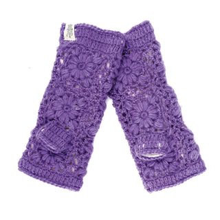Flower Crochet Handwarmers: This pair of purple wool fingerless gloves features a floral crochet pattern and a small white tag. They are laid flat with a slight overlap, perfect as cozy winter gloves for women.