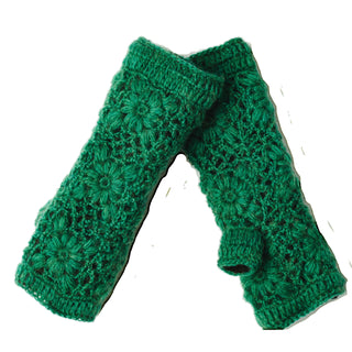 Flower Crochet Handwarmers: Green wool fingerless gloves with a floral crochet pattern, shown flat on a white background. Stylish and cozy, they're perfect winter accessories for women wanting warmth and dexterity.