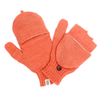 Hand Loom Bryant Fingerless Gloves w/ Flap in orange wool feature a convertible design: one mitten closed, the other showing fingerless gloves with a buttoned flap and knitted texture.