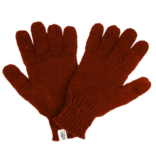 McCarren Gloves: Red Merino Wool gloves with a small white tag on one glove, displayed on a white background—ideal for keeping warm and stylish in winter.