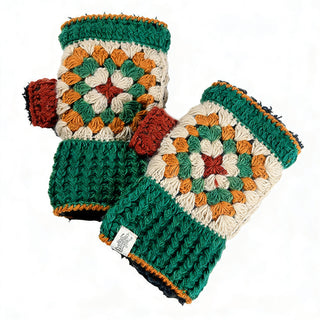 The Ryan Fingerless Gloves are handmade with a crochet granny square pattern in green, beige, orange, and rust, featuring ribbed green cuffs and a tag on one cuff, displayed on a white background.